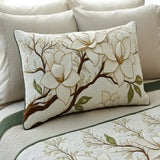 Quilted cushion cover with flowering magnolia