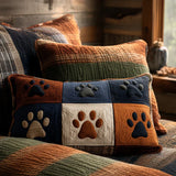 Quilted cushion cover with meadow and footprints