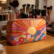 Quilted beauty case with a luminous flower